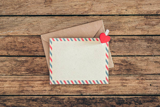 istock Blank postcard on wooden background, top view, copy space. 1885155374