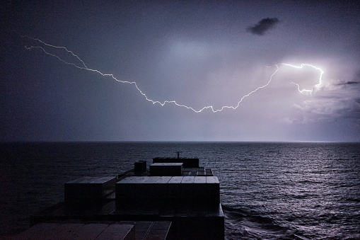 Thunderstorm with lightning in the ocean