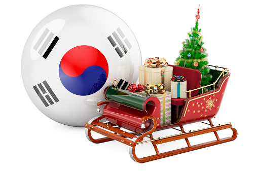 Christmas in South Korea, concept. Christmas Santa sleigh full of gifts with South Korean flag. 3D rendering isolated on white background