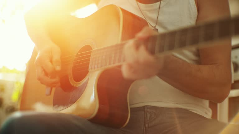 Practicing acoustic guitar at home