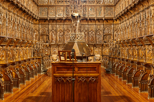 Cathedral interior in Zamora. Religious wooden choir stalls. Spain