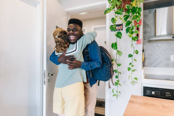 istock Friends embracing at home 1885224511