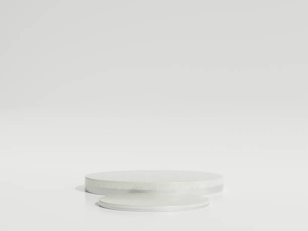 istock Round silver marble ceramic podiums forming a cylinder on white background. Perfect platform for showing your products. Three dimensional illustration 1885274779