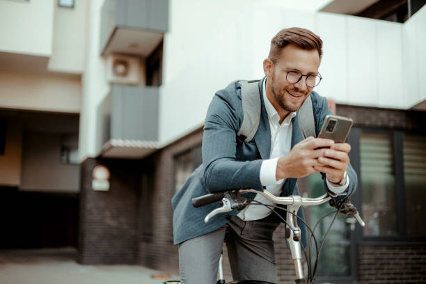 istock Commuter Texting on Smartphone in City Street 1885283620
