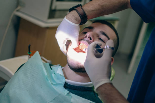 istock giving anesthesia for treatment and tooth extraction 1885383310