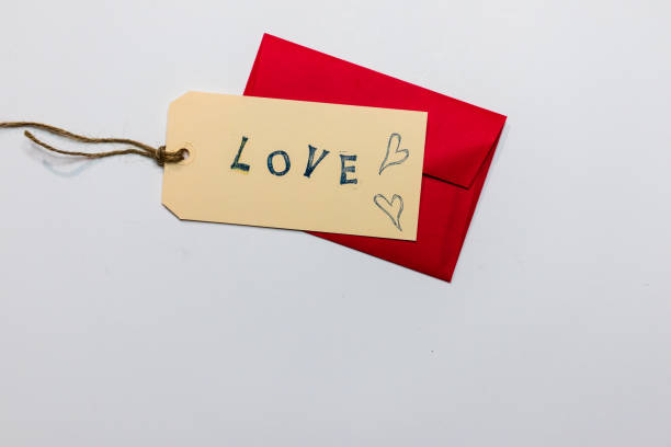 istock Love word tag on red envelope for Valentine's day 1885398902