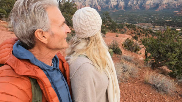 istock Mature couple enjoy desert landscape 1885409814