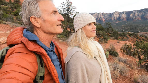 istock Mature couple enjoy desert landscape 1885409815