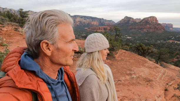 istock Mature couple enjoy desert landscape 1885409817