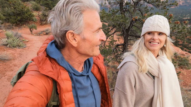istock Mature couple enjoy desert landscape 1885409818