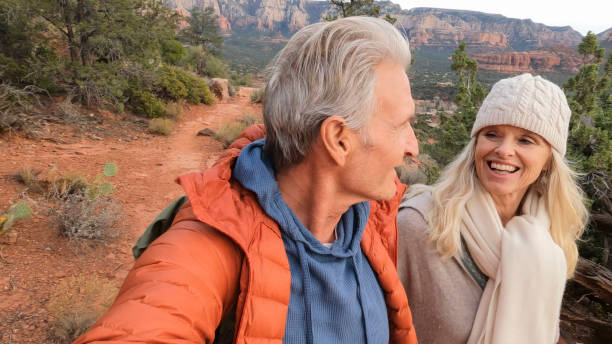 istock Mature couple enjoy desert landscape 1885410836