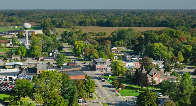 Leftward Descending Drone Shot of Village in Ingham County, Michigan