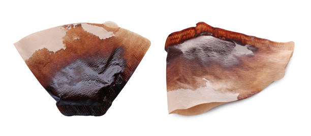 istock Two used coffee filters isolated on white 1885434802