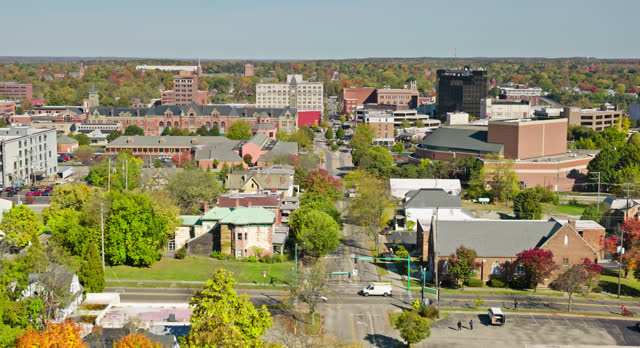 Forward Ascending Aerial Shot of Springfield, Ohio on Clear Day