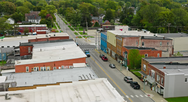 Leftward Ascending Orbiting Aerial of Small Town in Ohio on Overcast Day