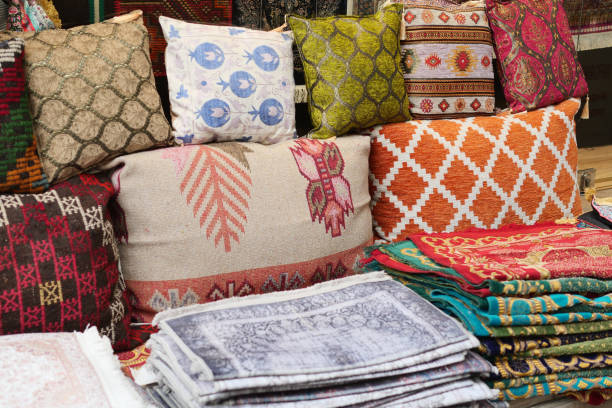 istock Colourful cushions on display for sale in a traditional Turkish Bazaar. 1885450577