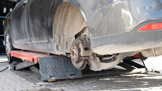 Car brake repair in workshop