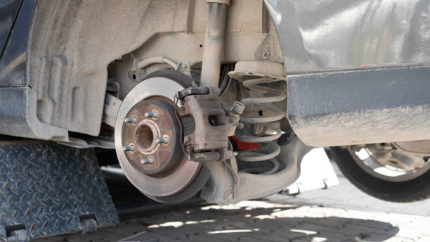 istock Car brake repair in workshop 1885458591