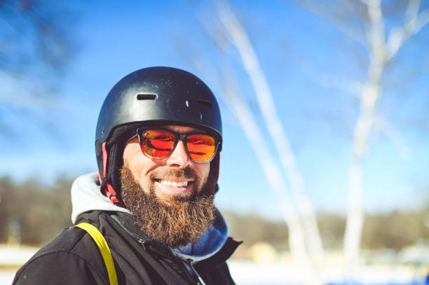 istock Middle age bearded man skiing on a ski slop in winter 1885465330