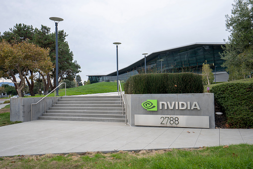 Santa Clara, CA, USA - Nov 22, 2023: The main entrance to NVIDIA's giant Voyager Building at its global headquarters in Santa Clara, California. NVIDIA invents the GPU and drives advances in AI, HPC, gaming, creative design, autonomous vehicles, and robotics.