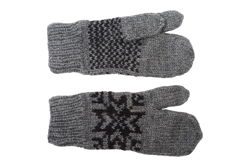 wool gray knitted three-fingered gloves on a white background