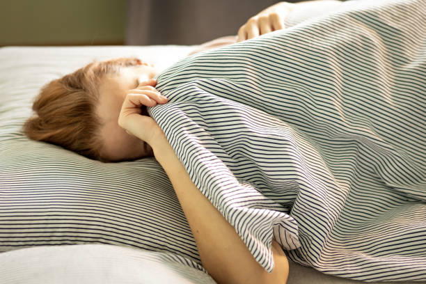 istock Sleeping 40 year old woman 1885510896