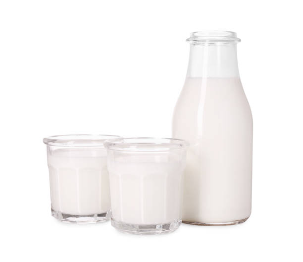 istock Glassware with tasty milk isolated on white 1885515675