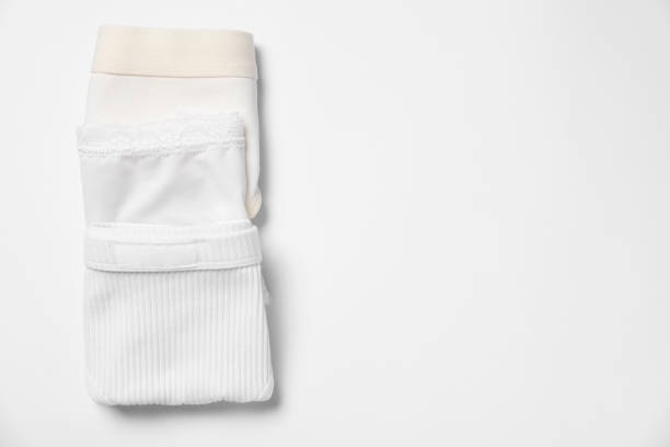 istock Stylish folded women's underwear on white background, flat lay. Space for text 1885667561