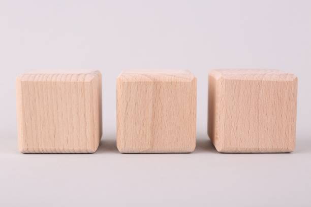 istock Blank wooden cubes on light grey background, closeup 1885693616