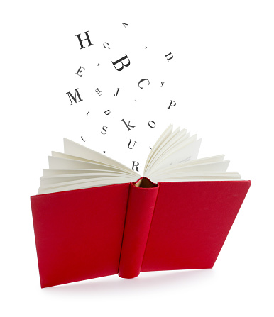 Open book in air with letters flying out of it on white background
