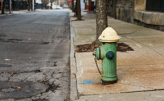 fire hydrant on urban sidewalk, essential emergency equipment for firefighters