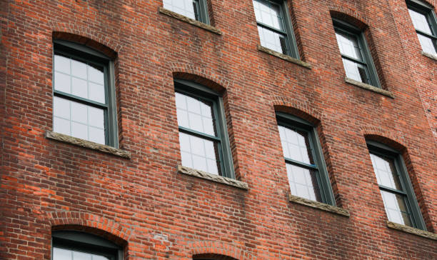 istock Brick building against blue sky, symbolizing stability and architectural legacy 1885729901