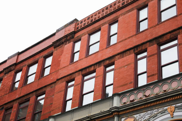 istock Brick building against blue sky, symbolizing stability and architectural legacy 1885729907