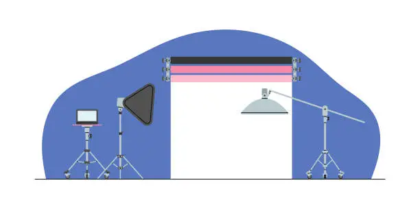 Vector illustration of Photo studio interior. Paper backdrop, light soft box, light stand and a table with a laptop.