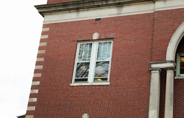 istock Brick building against blue sky, symbolizing stability and architectural legacy 1885731985