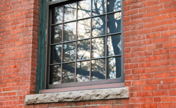 istock Brick building against blue sky, symbolizing stability and architectural legacy 1885734033