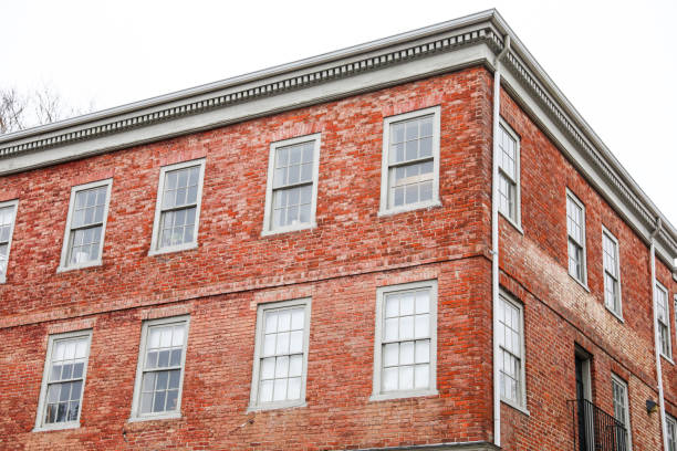 istock Brick building against blue sky, symbolizing stability and architectural legacy 1885743344