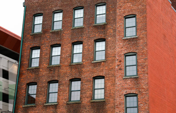 istock Brick building against blue sky, symbolizing stability and architectural legacy 1885743347