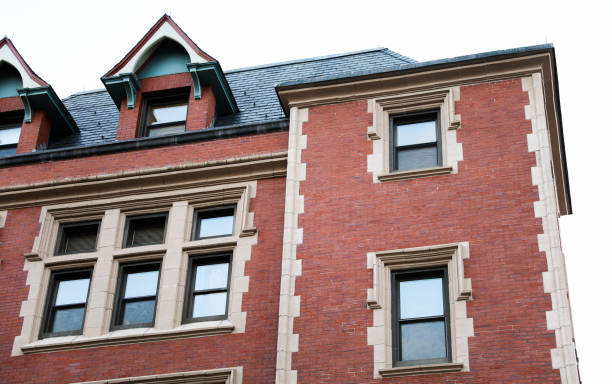 istock Brick building against blue sky, symbolizing stability and architectural legacy 1885743350