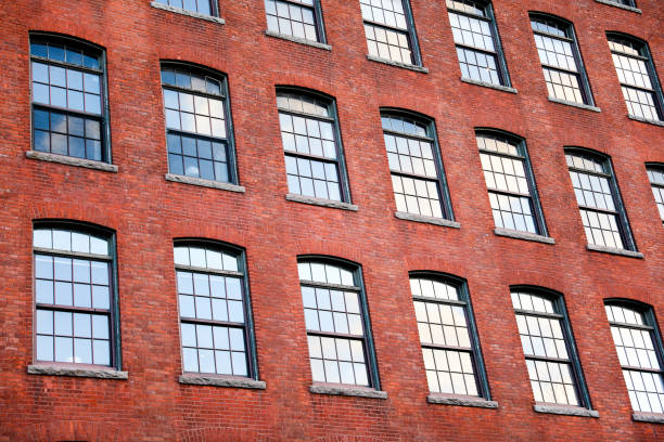 istock Brick building against blue sky, symbolizing stability and architectural legacy 1885746438