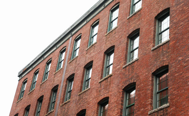 istock Brick building against blue sky, symbolizing stability and architectural legacy 1885746949