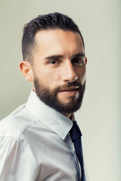 istock Businessman's subtle smile suggests approachability 1885785747