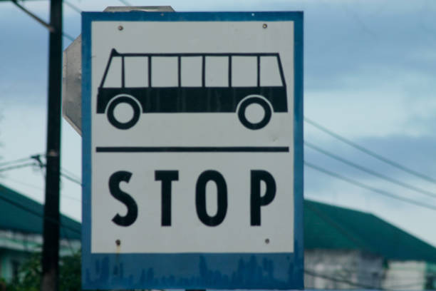 istock Bus Stop Sign on post pole, traffic road roadsign 1885849889