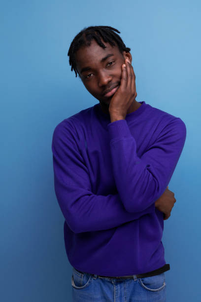 istock funny american young man with dreadlocks in a blue sweatshirt 1885883707