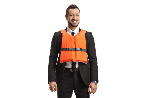 Businessman wearing an orange life vest and smiling isolated on white background