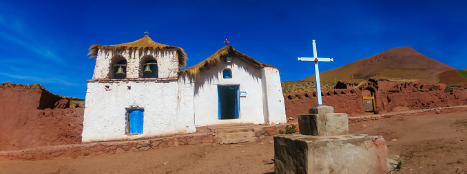 Typical Andean mud-brick house in the village of Machuca, in the Atacama Desert in the Chilean highlands. Yard in front of the church in Machuca, a small Andean village of 20 houses a few kilometres from San Pedro de Atacama.