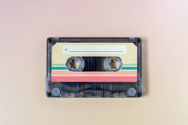 istock Top view of a music cassette on a yellow background. 1886064265