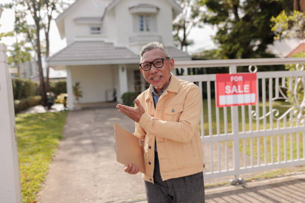 istock Portrait of a smiling real estate agent 1886103421