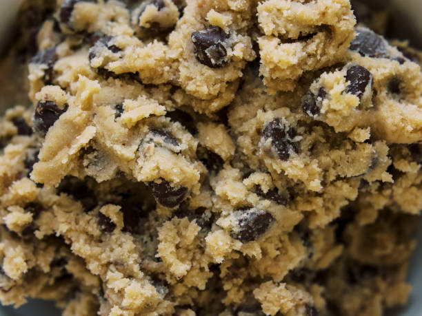 istock homemade cookie dough in white bowl on white marble background 1886171326