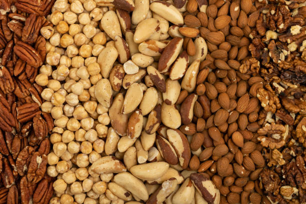 istock Top view of different varieties of nuts layered 1886201417